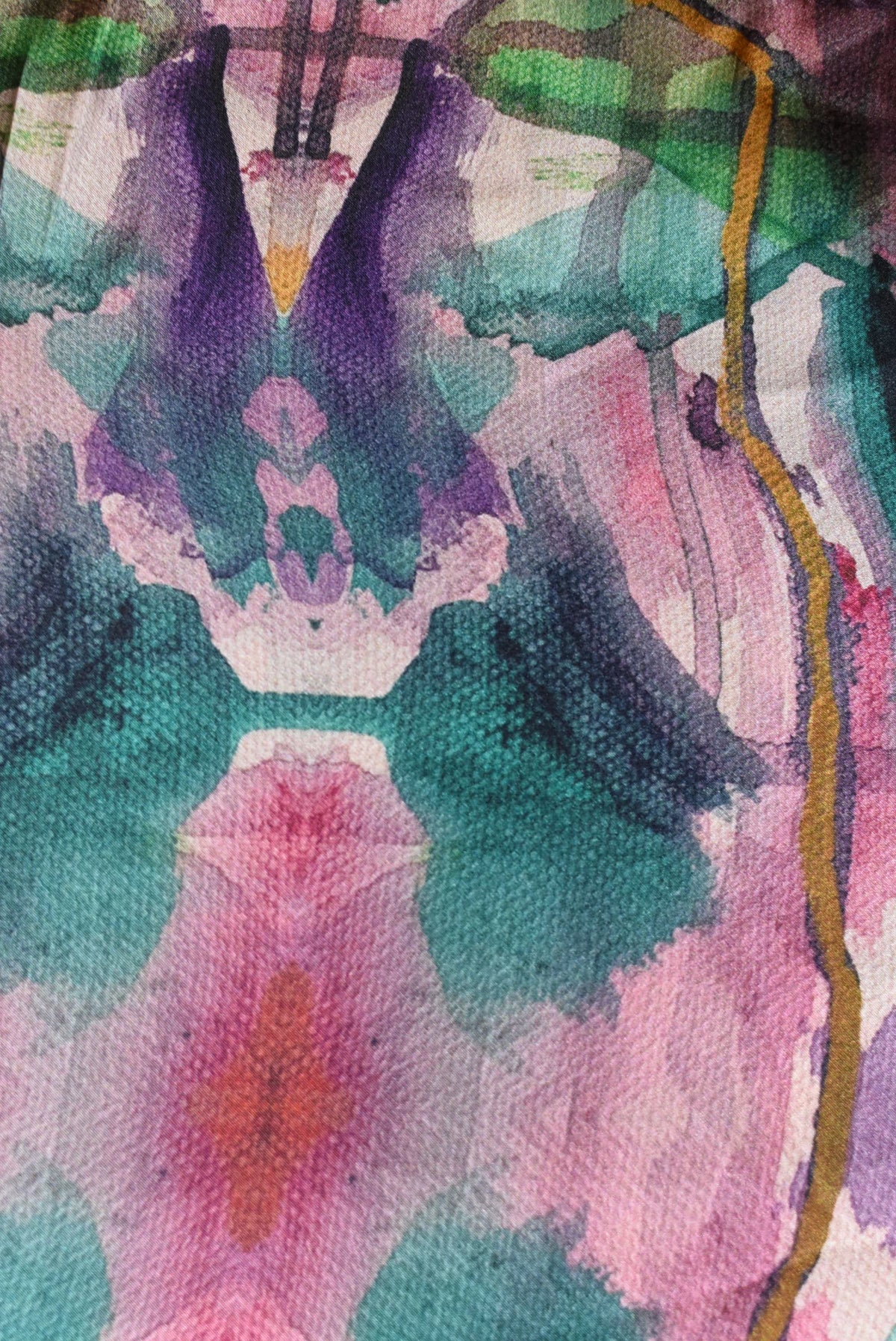 Abstract art with watercolor textures in pink, green, and purple.