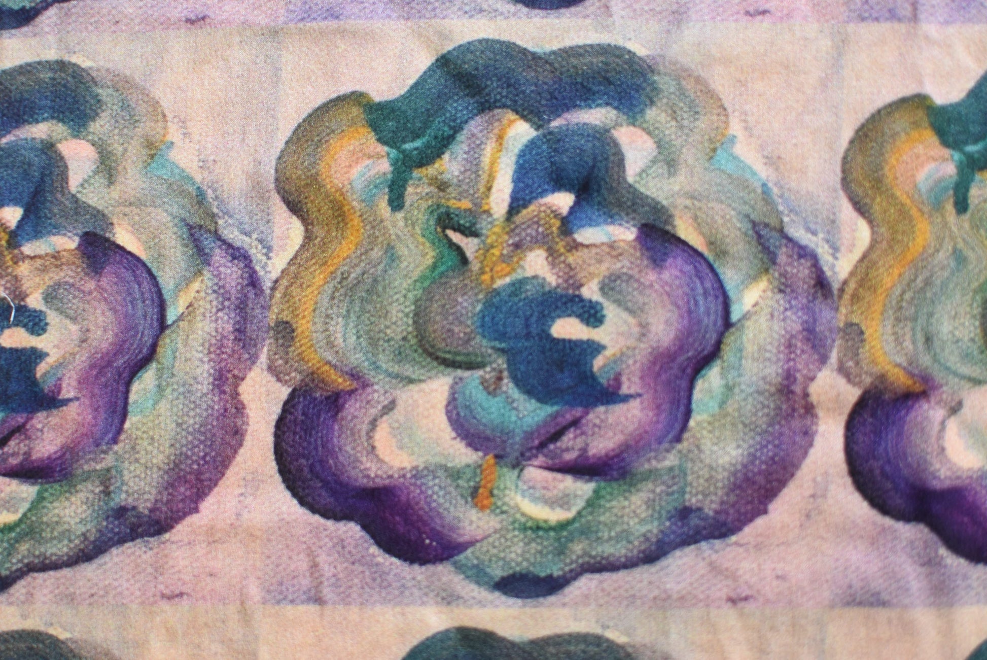 Artistic depiction of swirling colors on a textured surface