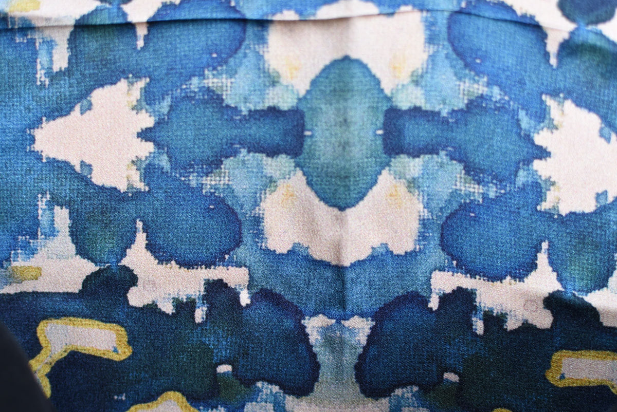Close-up of a fabric with blue and white abstract pattern