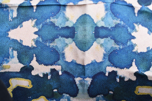 Close-up of a fabric with blue and white abstract pattern