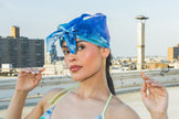 Woman wearing a blue headscarf 