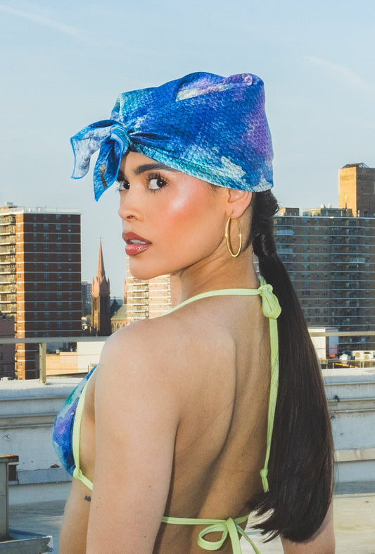 Woman wearing a blue headscarf 