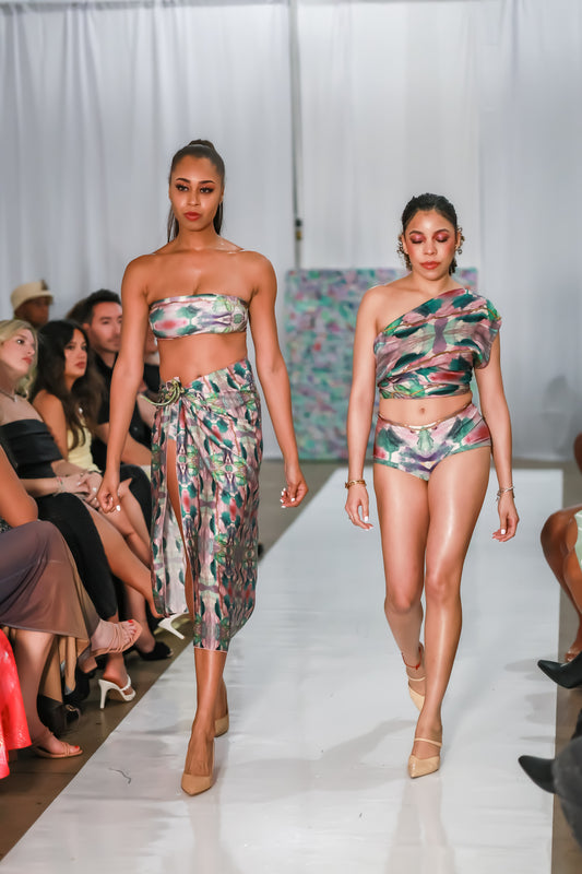 Front runway view of Jungla shortie bikini bottoms styled with a matching printed top.